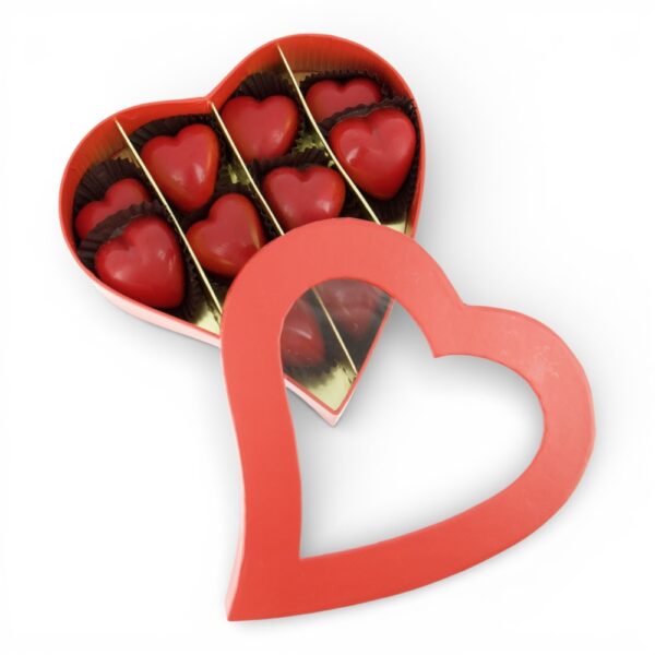 Cœur rouge ouvert contenant 10 chocolats praliné lait en forme de cœur