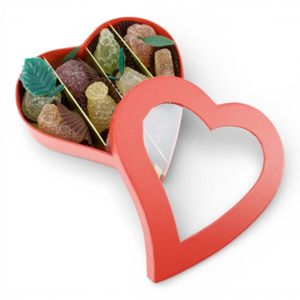 Cœur rouge ouvert contenant 10 pâtes de fruits de différentes saveurs