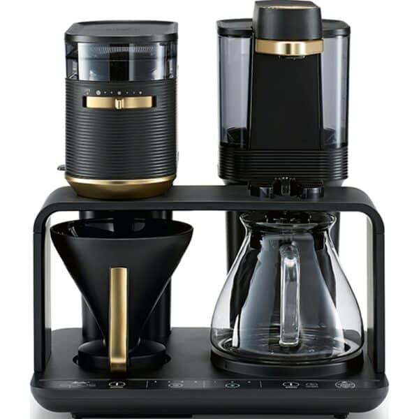 Porte-filtre de la Melitta Epos placé sous le broyeur avant son déplacement vers le poste d’infusion.